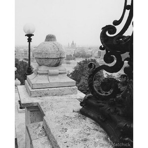Fine Art Black & White Architecture Photography of Ironwork Lamp and Stone Ball in Budapest Hungary
