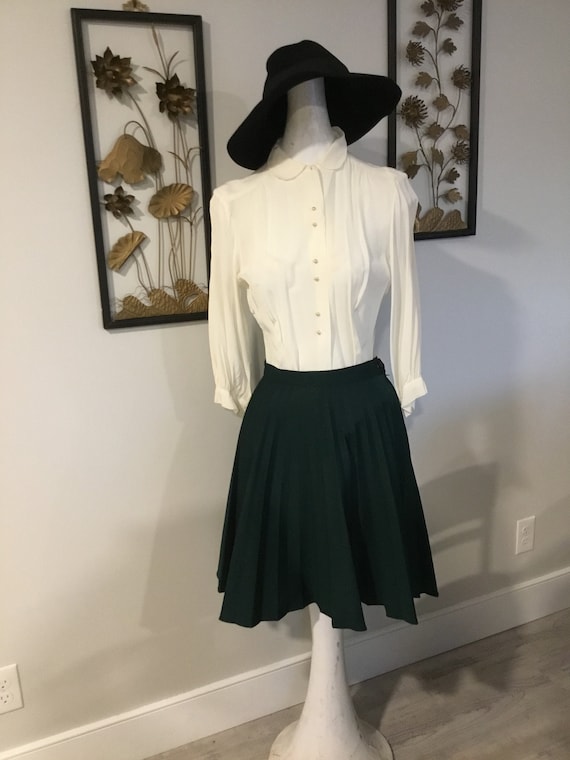 Green Pleated Mini Skirt Fun And Flirty Hemline Fu