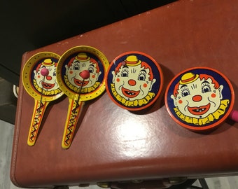 Tin Noise makers Kirchhof Colorful Tin Noise makers Circus Clowns Colorful Clowns Golden Yellow Red Blue Primary set of 4 Made in New Jersey