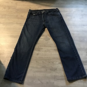 Levi&#39;s Original 514 Jeans Straight Leg Zipper Fly 38 waist 32 length red Levi tag on back R Label on Pocket Original Hem Slight Fade