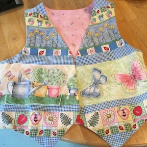 Novelty Fabric Vest Garden Lover Vest Scenes from a Garden Butterflies Strawberries Daisies Watering Cans Potted Plants Lady Bugs Sunflowers image 1