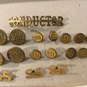 CONDUCTOR Hat Badge and LOT of SSL Brass Tone Buttons and Tacks 18 Pieces
