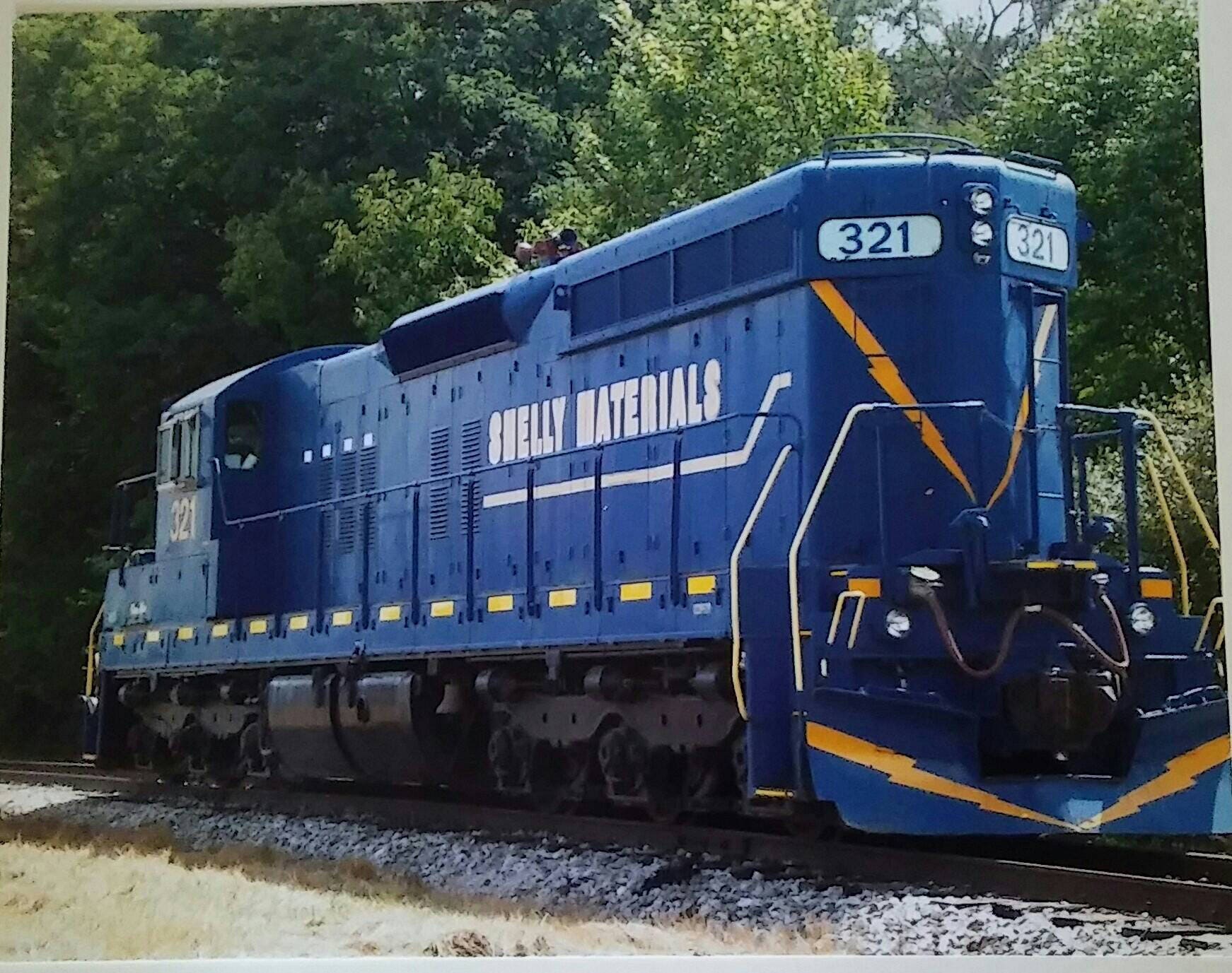 Blue diesel railroad train engine picture