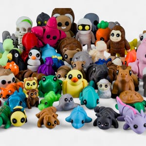 a large number of colorful toy animals and objects, including a variety of small animals, insects, and other playful items.