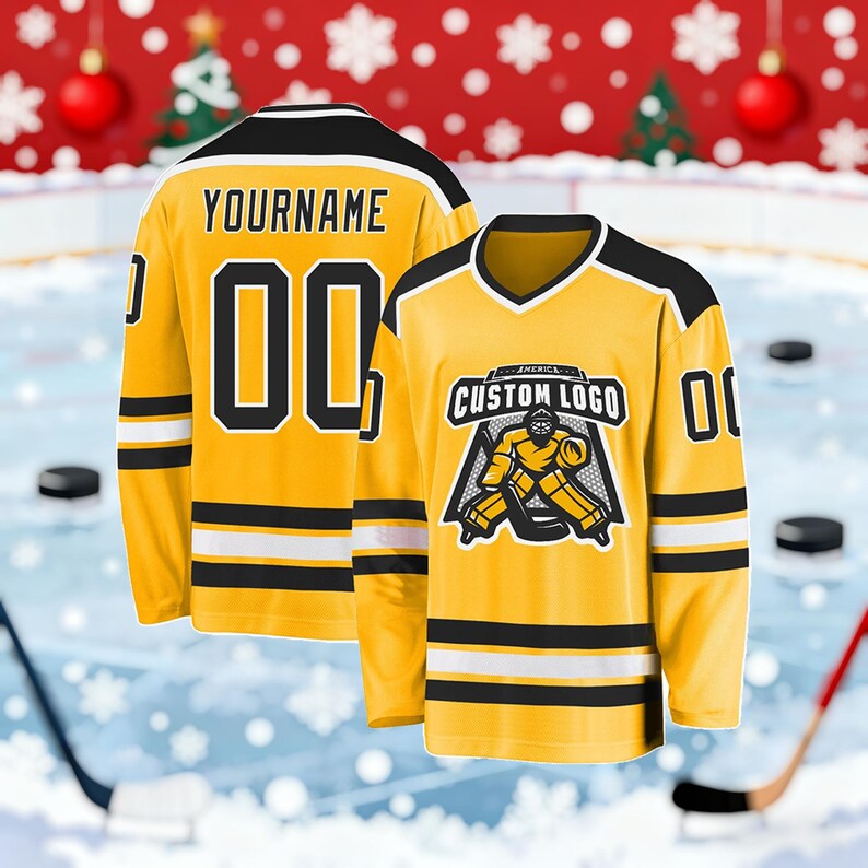 May include: Two yellow hockey jerseys with black and white accents. One jersey displays the text "YOURNAME" and the number "00". The other jersey features a custom logo and the number "01". The jerseys are set against a hockey rink background.