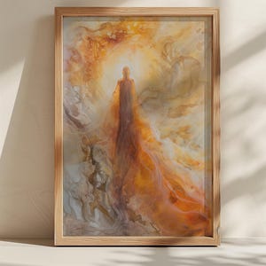 May include: Abstract art print in a wooden frame. The artwork features a figure in a flowing robe, bathed in warm, golden light. The background has swirling patterns of orange, brown, and white, creating a sense of movement and depth.