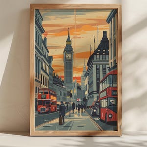 May include: A framed art print depicting a London street scene. The artwork features Big Ben, red double-decker buses, and pedestrians. The color palette includes shades of orange, gray, and red, creating a vintage aesthetic.