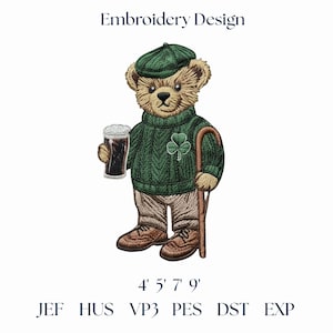 May include: An embroidered design of a teddy bear wearing a green sweater with a shamrock, a green cap, and holding a pint of dark beer. The bear also has a walking stick and is wearing brown shoes and pants. The text "Embroidery Design" is at the top.