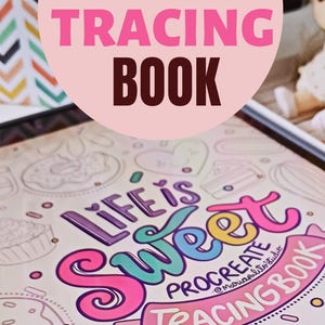 May include: A Procreate Tracing Book with the text "Life is Sweet" in colorful lettering. The design includes illustrations of desserts and the artist's website address. The book is designed for digital art tracing.
