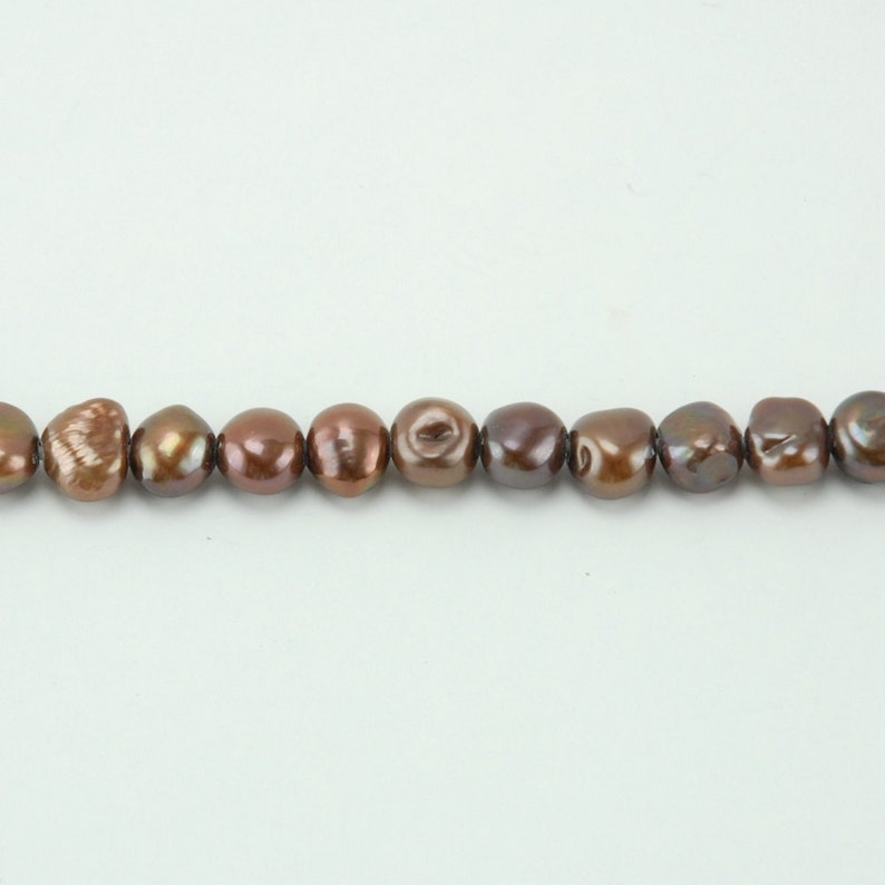 BH7 11mm Chocolate Horizontal Baroque Big-Hole Pearl
