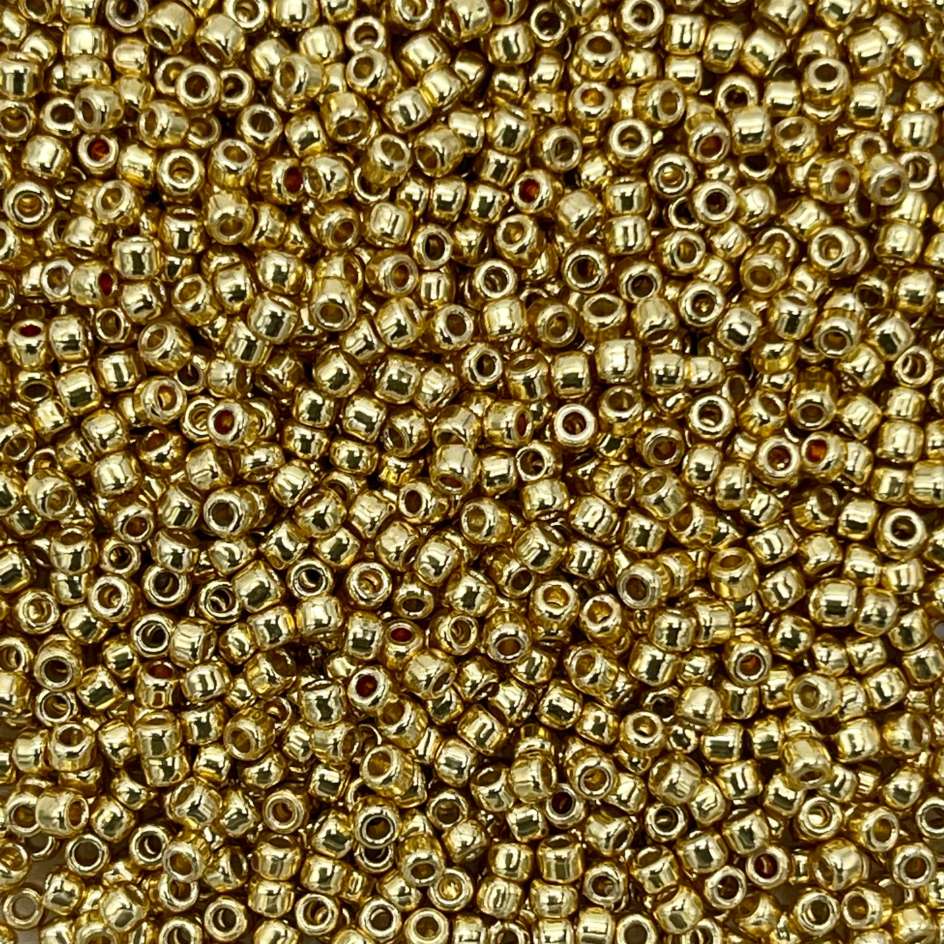 10g TOHO seed beads 11/0 (2mm), small Japan rocailles, #PF557 Gold Permanent Finish Starlight