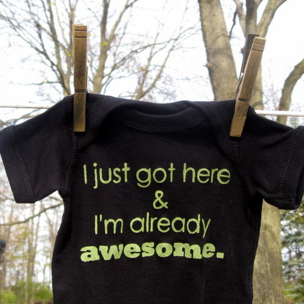 I just got here & I'm already awesome  --- black onesie size 0-3 months.