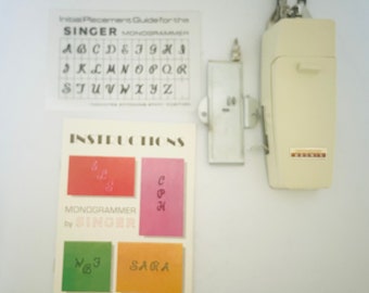 Máquinas de coser Singer Monogrammer con aguja inclinada y puntada en zigzag, número de pieza 171256, letra S faltante.