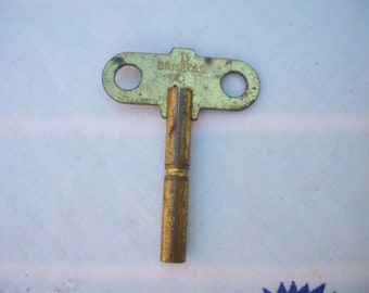 Vintage Bristols Clock Key Gold Tone Marked