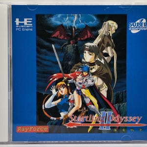 May include: A PC Engine CD-ROM game case for Startling Odyssey II. The cover art features several anime-style characters, a dragon, and the game's title. The background is a dark blue with lightning.