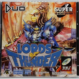May include: A video game case for "Lords of Thunder" featuring a vibrant illustration of armored figures and the game's title in bold blue and yellow lettering. The case includes the "SUPER CD-ROM² SYSTEM" logo and the Hudson Soft logo.
