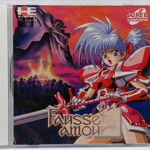 May include: A video game cover featuring a female anime character in red and white armor holding a large sword. The background is a fiery landscape with a large mechanical structure in the distance. The title of the game is "Faussete Amour" in a gold font.