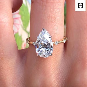 3 Ct Pear Cut Moissanite Engagement Ring with Hidden Halo and Diamond Accent Band in 14K Yellow Gold, Elegant Teardrop Solitaire Ring