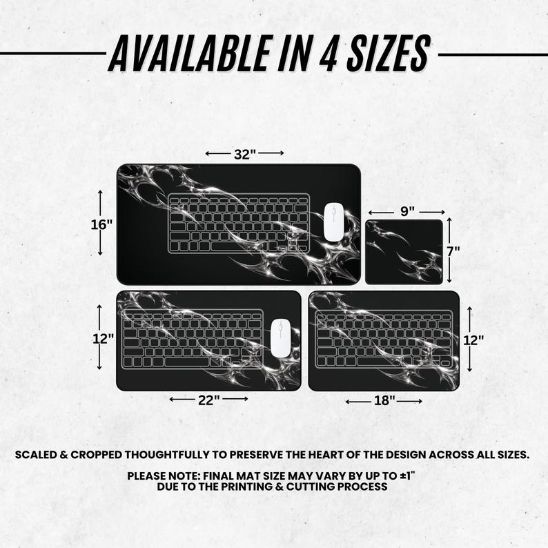 May include: A set of four black desk mats with a white abstract smoke pattern, labeled AVAILABLE IN 4 SIZES. Dimensions shown are 32x16 inches, 9x7 inches, 22x12 inches, and 18x12 inches. Text states: SCALED & CROPPED THOUGHTFULLY TO PRESERVE THE HEART OF THE DESIGN ACROSS ALL SIZES. PLEASE NOTE: FINAL MAT SIZE MAY VARY BY UP TO &plusmn;1 INCH DUE TO THE PRINTING & CUTTING PROCESS.