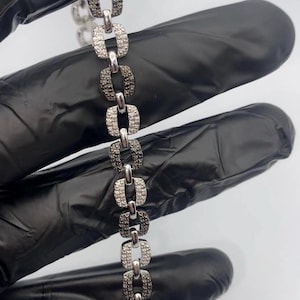 Sterling silver black and white natural Diamond bracelet .5 total carats rhodium plated for anti tarnish and extra shine 7.5in lobster clasp