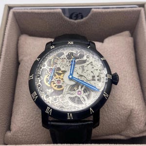 Men&#39;s wrist watch stainless steel silver tone skeleton dial black leather strap Charles Hubert Paris