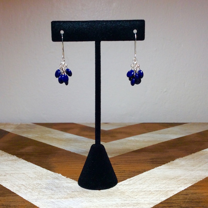 Deep purple wafer cluster earrings on silver plated hooks.