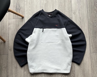 Sudadera vintage Nike Mini Swoosh con bolsillo central y forro polar