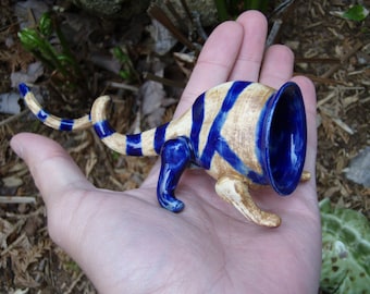 Curly Creature - ceramic art, brown with blue stripes - Curly Creature 1