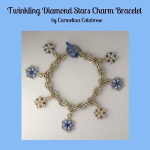 May include: A gold chain bracelet with six dangling star-shaped charms. The charms are made of blue and white beads. The bracelet is on a white background.