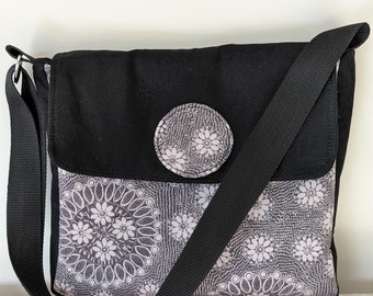 Black and Grey Messenger