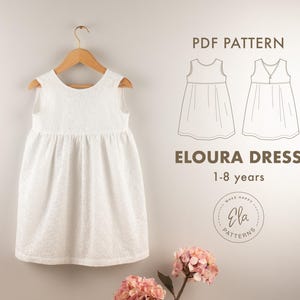 May include: A white sleeveless dress with a floral pattern hangs on a wooden hanger. The dress is displayed with a PDF pattern illustration and the text "ELOURA DRESS 1-8 years". A logo with the text "Ela Patterns" is also visible.
