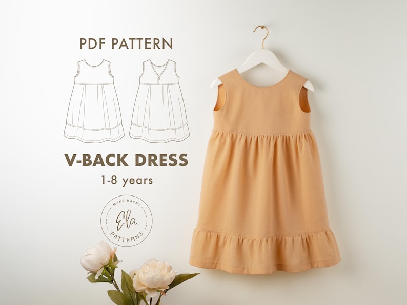 May include: A peach-colored V-back dress for ages 1-8 years hangs on a white hanger. The dress has a gathered bodice and a ruffled hem. The image also includes a line drawing of the dress and the text "V-BACK DRESS 1-8 years".