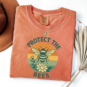 Camiseta &quot;Protege a las abejas&quot;, camiseta retro con gráfico de abejas, regalo para amantes de la naturaleza, camiseta &quot;Salva a las abejas&quot;, colores cómodos, camiseta retro de abejas, diseño de abejas con flores