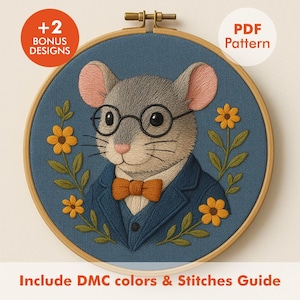May include: Cross-stitch pattern in a wooden embroidery hoop. The design features a mouse wearing glasses, a blue suit, and an orange bow tie, surrounded by yellow flowers and green leaves. Text includes "PDF Pattern" and "+2 Bonus Designs".