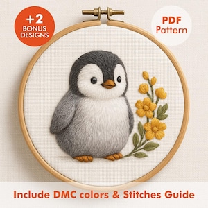 May include: A cross-stitch embroidery hoop featuring a cute penguin with gray and white feathers, a yellow beak, and black eyes. Yellow flowers and green leaves are next to the penguin. The text "+2 BONUS DESIGNS" and "PDF Pattern" are visible.