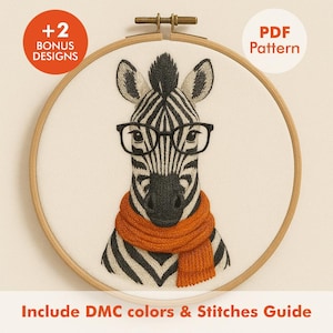 Peut inclure: Broderie d'un zèbre portant des lunettes et une écharpe orange, dans un cercle à broder en bois. Le motif comprend le texte "+2 BONUS DESIGNS", "PDF Pattern" et "Include DMC colors & Stitches Guide".