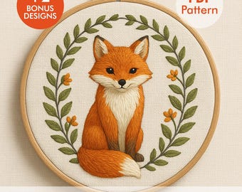 May include: A cross-stitch pattern of a fox with orange and white fur, encircled by a green leaf wreath and orange flowers. The text "+2 BONUS DESIGNS" and "PDF Pattern" are visible. The text "Include DMC colours & Stitches Guide" is also included.