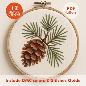 May include: Embroidery hoop featuring a detailed pinecone and branch design. The pinecone is brown, and the needles are green, stitched on a cream-colored fabric. Includes the text "PDF Pattern" and "+2 Bonus Designs".