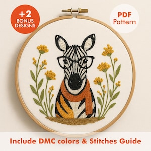 May include: Embroidered zebra wearing glasses and an orange scarf, surrounded by yellow flowers and green leaves, in a wooden embroidery hoop. Includes text: "+2 Bonus Designs" and "PDF Pattern". The bottom text reads: "Include DMC colors & Stitches Guide".