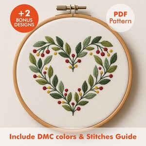 May include: Embroidery hoop with a heart-shaped design of green leaves, red berries, and yellow accents. The text "PDF Pattern" and "+2 Bonus Designs" are visible. The text "Include DMC colors & Stitches Guide" is also present.
