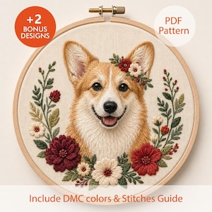 May include: A circular wooden embroidery hoop containing a needlepoint portrait of a Corgi dog surrounded by a wreath of red and white flowers and green leaves. The text +2 BONUS DESIGNS, PDF Pattern, and Include DMC colors & Stitches Guide appear.