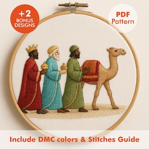 May include: Embroidery hoop featuring a detailed cross-stitch design of the three wise men and a camel. The figures are dressed in red, teal, and green robes, carrying golden gifts. The text "PDF Pattern" and "+2 Bonus Designs" are visible.