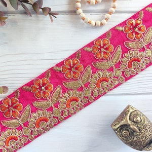 Indiase versieringen, borduurkant, sarikant, India veters, paillettenranden, felroze bekleding, oranje en gouden veters, bloemenversieringen - Lace778