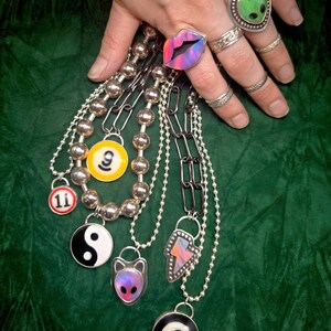 small and large billard ball necklaces to show size context. ball chain