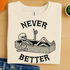 Funny Skeleton in Coffin PNG Clipart – Never Better Gothic Halloween Digital Art for Skeleton Designs, T-Shirts, Mugs, Sublimation, and DTF