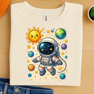 Cute Astronaut PNG Clipart – Space Explorer Design with Planets and Cartoon Sun for Kids, Sublimation, DTF Printing, T-Shirts and Mugs