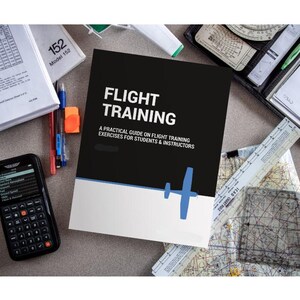 May include: A black and white book titled "Flight Training: A Practical Guide on Flight Training Exercises for Students & Instructors" with a blue and white silhouette of a small airplane on the cover.