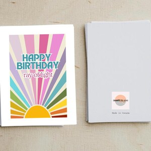 Carte rayon de lumière joyeux anniversaire
