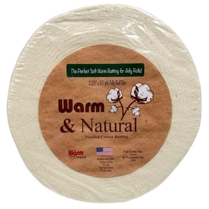 May include: A roll of Warm & Natural needled cotton batting for jelly rolls. The label is brown with the text "Warm & Natural" and "The Perfect Soft Warm Batting for Jelly Rolls!" The roll is 2.25" x 50 yds.