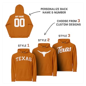 May include: Orange hoodies with white text and designs. One hoodie has the word "Texas", another has a longhorn graphic, and the third has the word "Texas" in a different font. The back of one hoodie can be personalized.